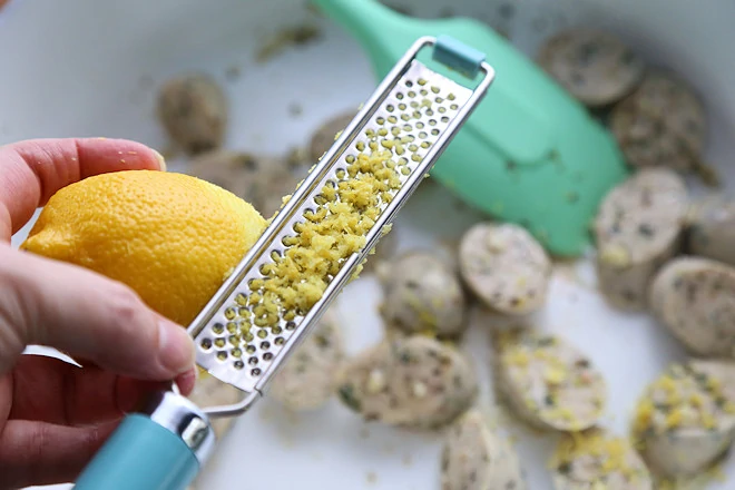 Zest lemon into pan