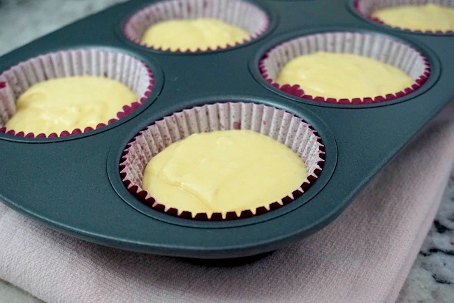 batter in cupcake liners