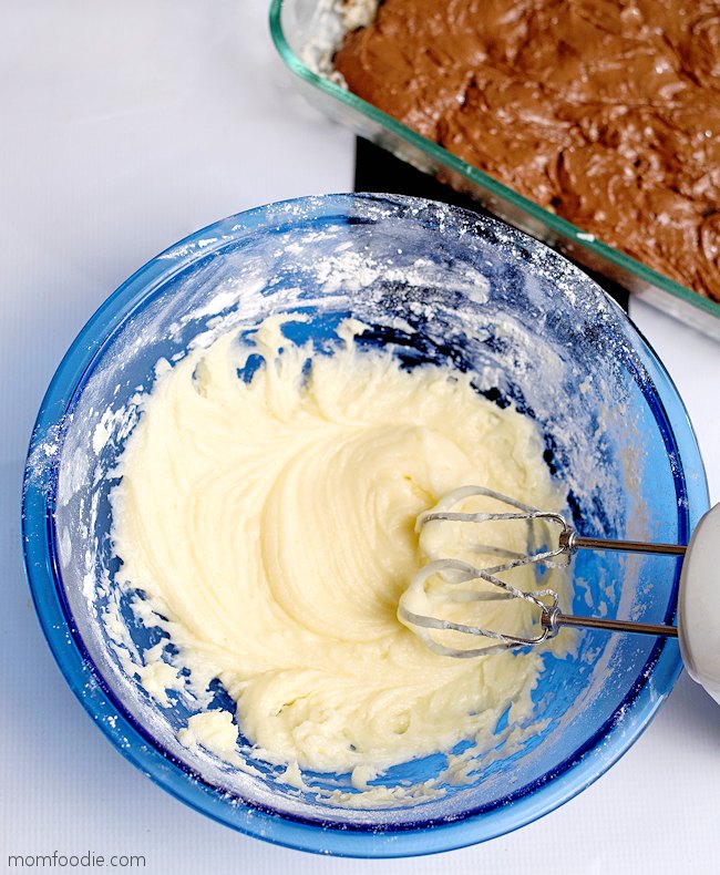 beat powdered sugar with butter and cream cheese