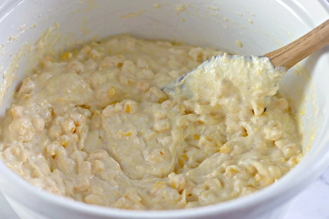 corn pudding mixture being stirred.