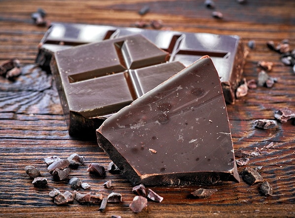 dark chocolate on cutting board.