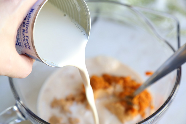 evaporated milk poured into batter bowl