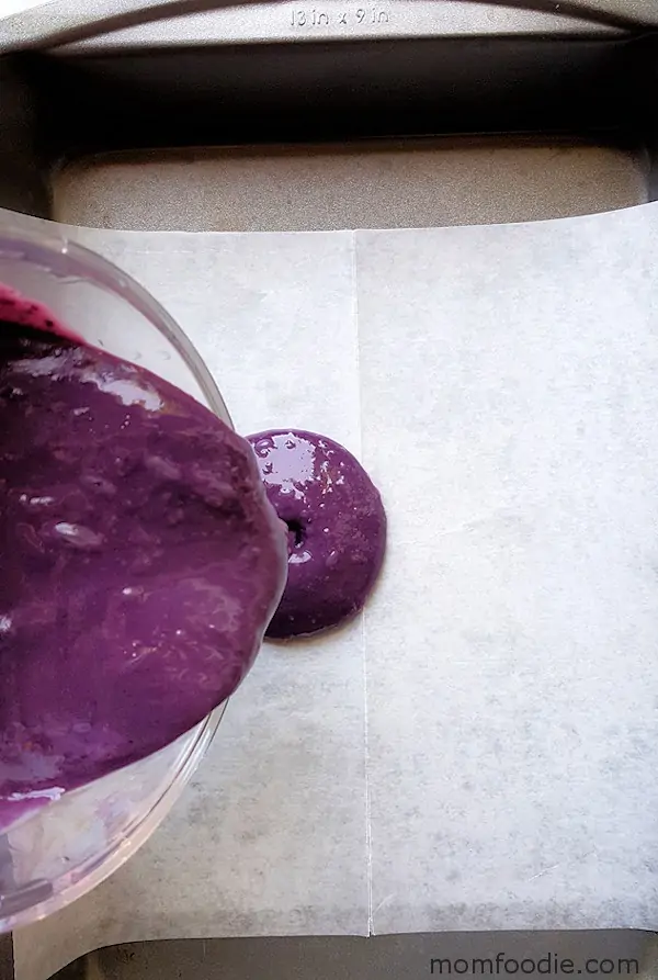 pouring blackberry yogurt mixture