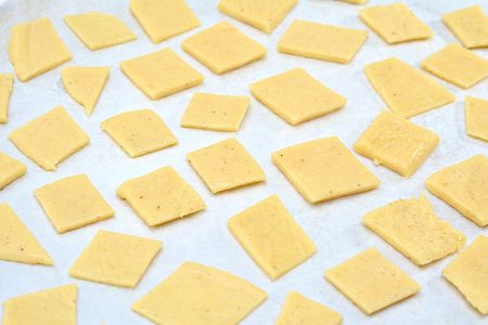 keto cheese crackers on baking sheet
