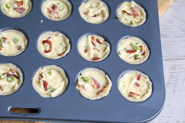 mini bacon quiche ready for oven