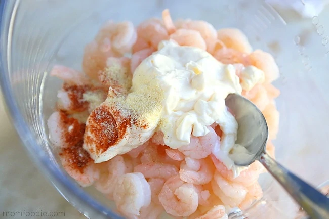 https://momfoodie.com/wp-content/uploads/mix-shrimp-with-mayo-and-seasoning.webp