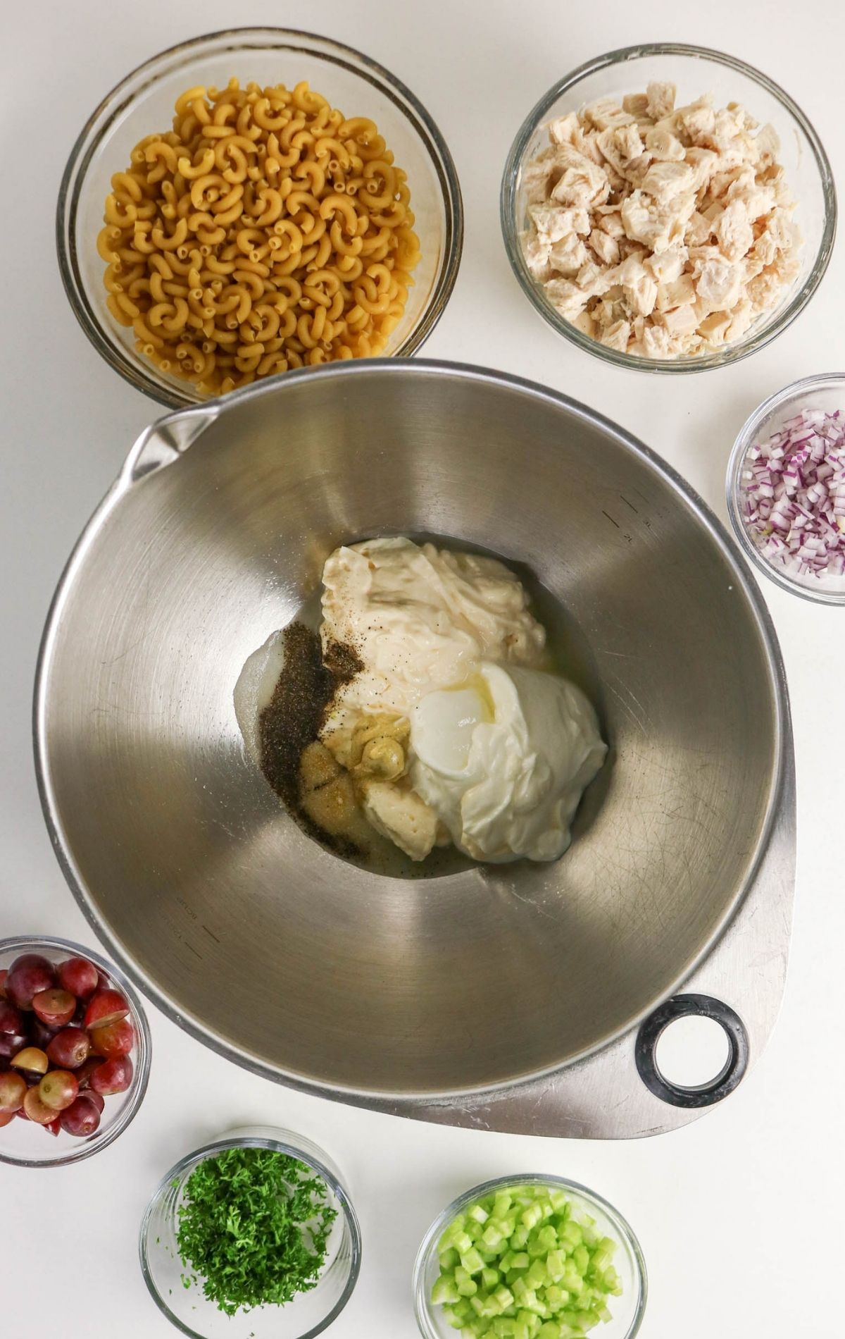 mixing the pasta salad dressing