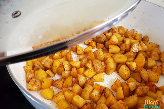 seasoned potatoes in skillet