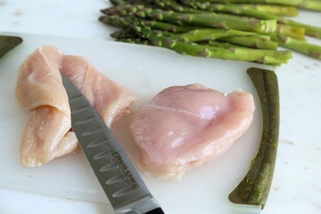 slicing chicken to stuff