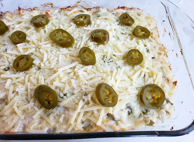 top with cheese and jalapeno